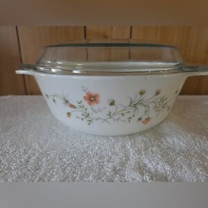 vintage JAJ Pyrex casserole dish with a lid in the Emily Spring Garden pattern.